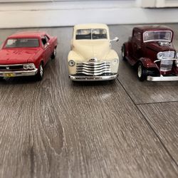 Diecast Cars 1/24 Scale Lot Of 3 Cars Good Condition  20 Dollars For All 3 Cars 