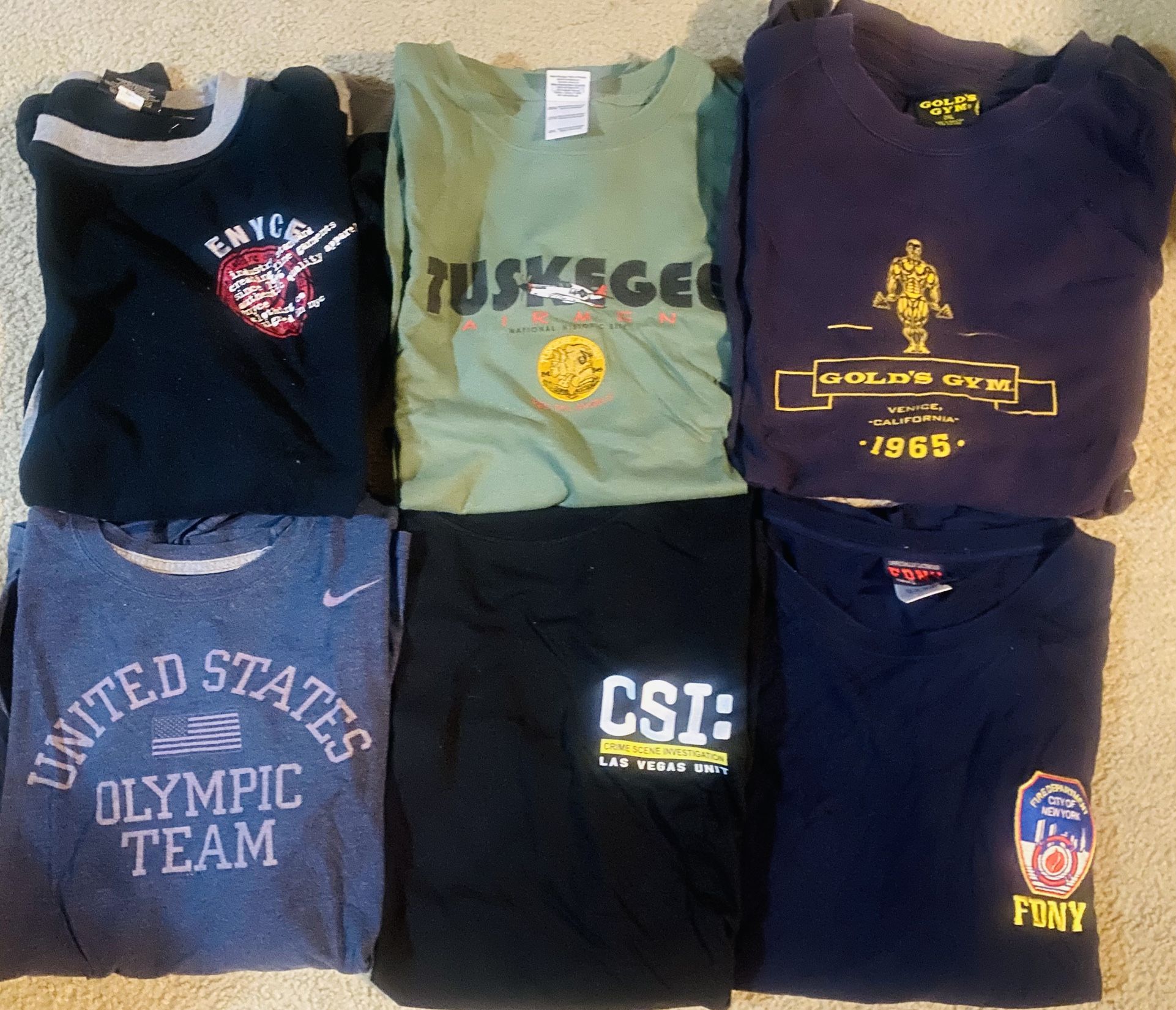 Collection of Men's tops including brands like Gold's Gym and Nike! This is the ultimate Mega Man shirt collection! Includes: -Gold's Gym Venice Cali