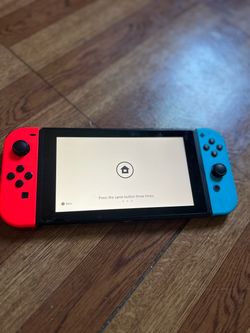 Nintendo Switch with Neon Joy-Cons and Carrying Case