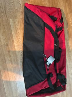 Champion Large Red and Black Wheeled Duffel Bag