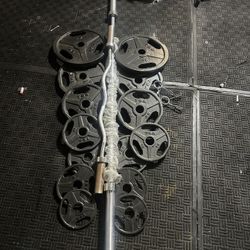 Olympic weights set plus 7ft bar plus curl bar firm price