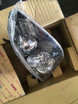 02 Nissan Altima headlight passenger side