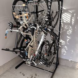 4‑Bike Bundle: 2 Trek E‑Bikes + Specialized MTB + Dutch City Bike + Storage Rack