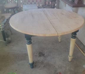 Wood round table .