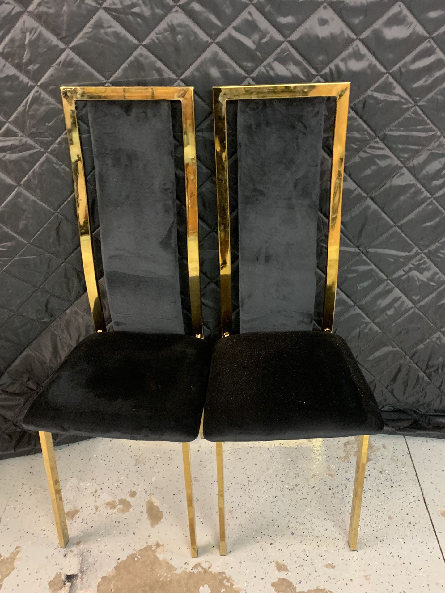 2 Black And Gold Chairs