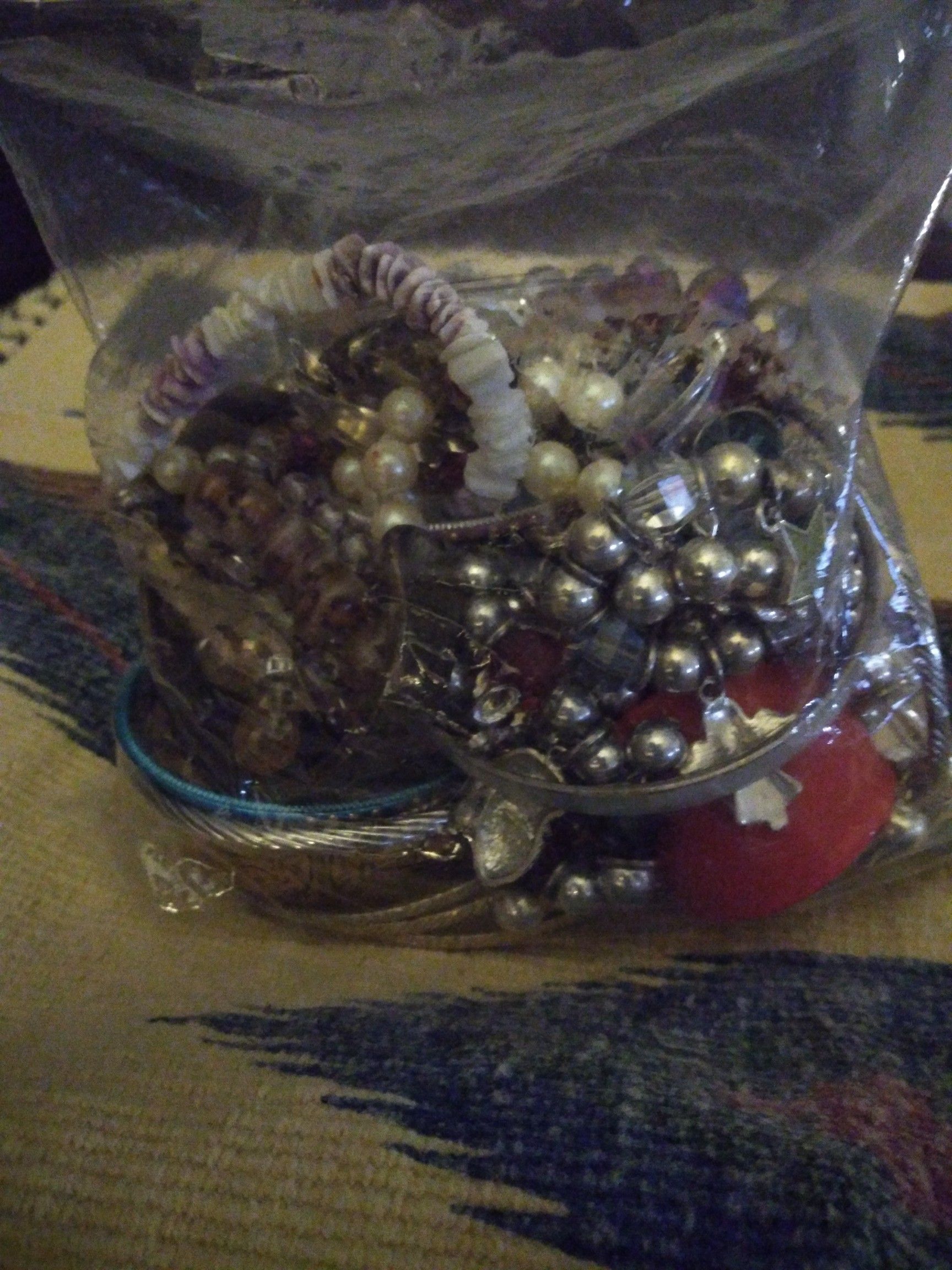 A large bag of misc jewelry& 2 med. size bags