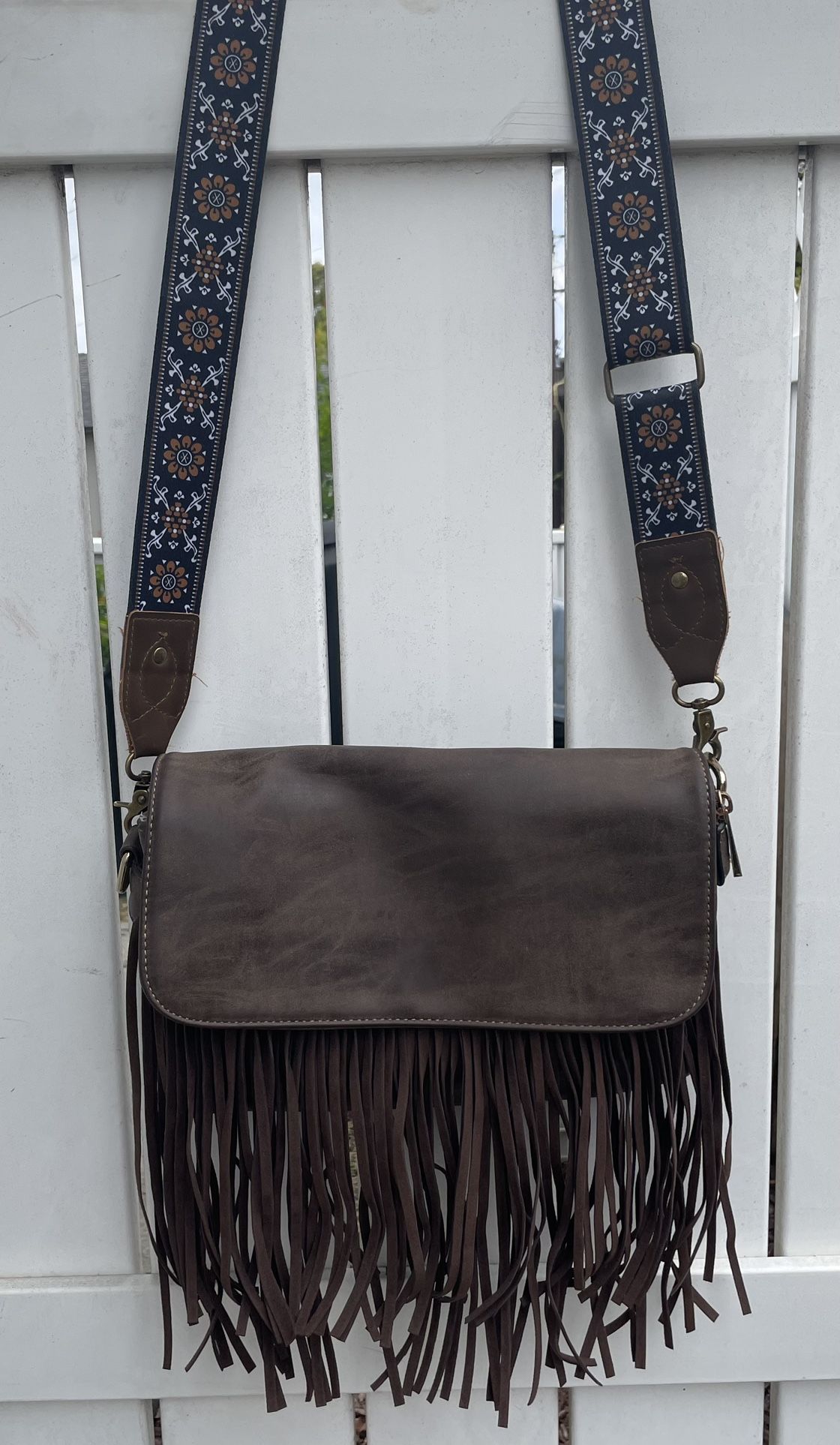 Woman’s Faux Leather Shoulder Bag With Fringe