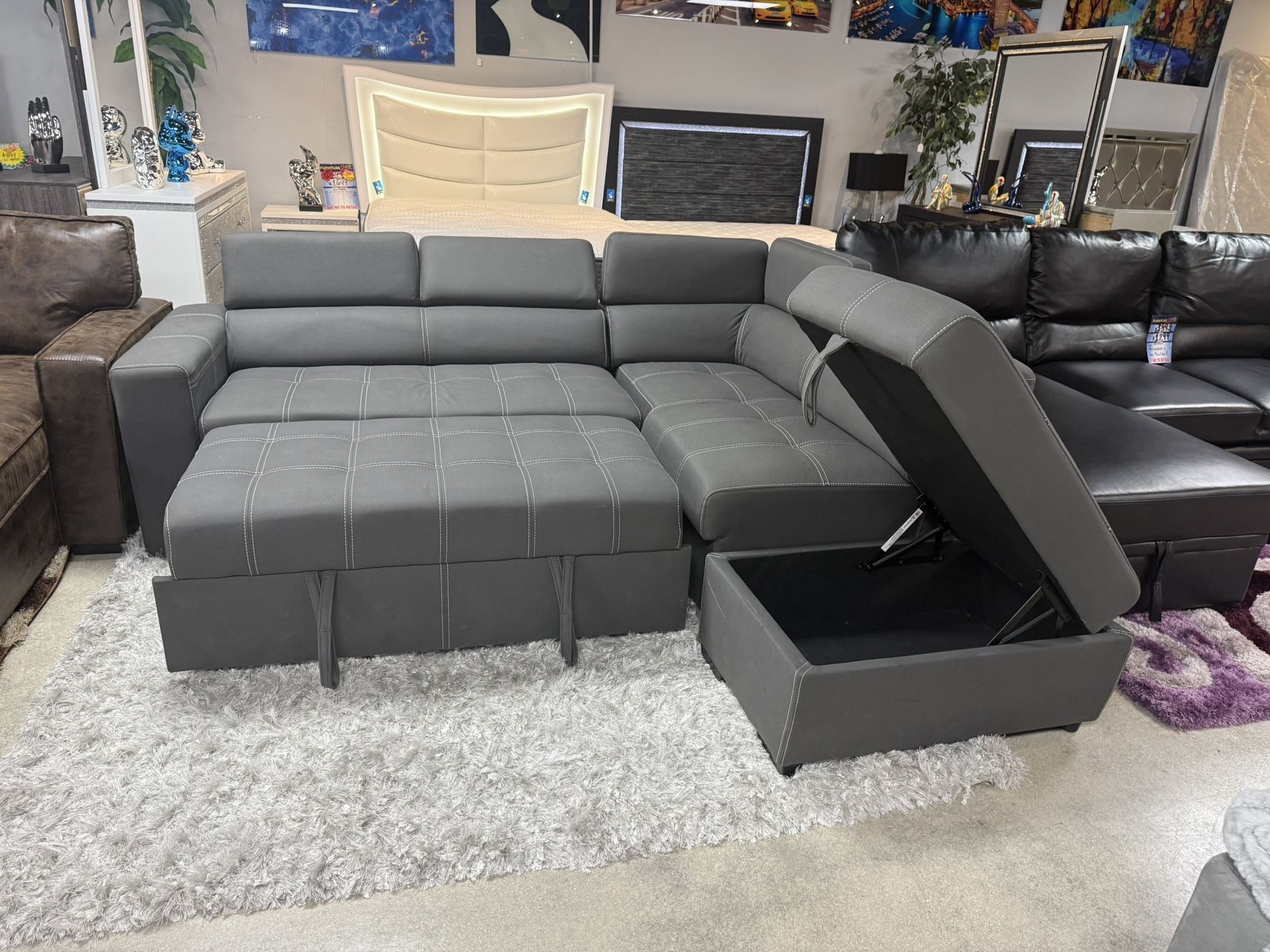 Pull Out Sleeper Sectional With Storage Ottoman Only $1099