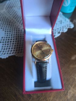 Reloj de oro de 14 k trabaja perfectamente el presio es fijo