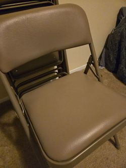 Folding padded metal chairs