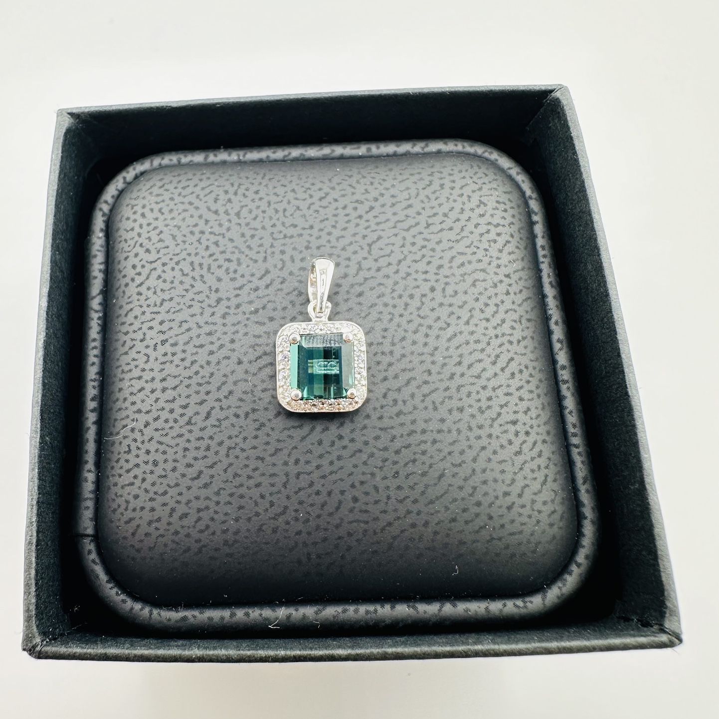 14ct White Gold Emerald And Diamond Pendant