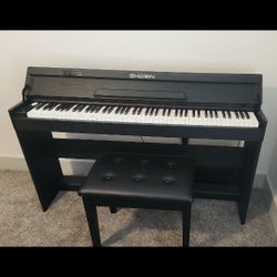 Piano Like New 240.00