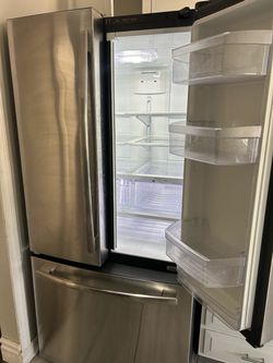GE double door refrigerator with ice maker