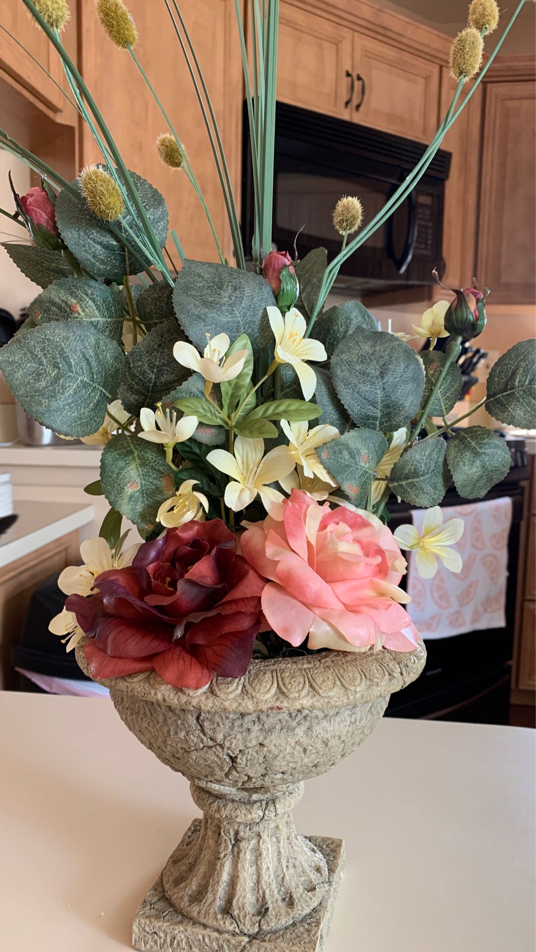 Faux flowers in vase