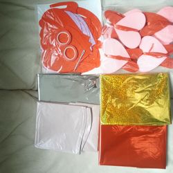 Galentiens  Day decorations.3 red heart-shaped balloons, 2 gold, 2 silver, 2 pink, and some heart-sh