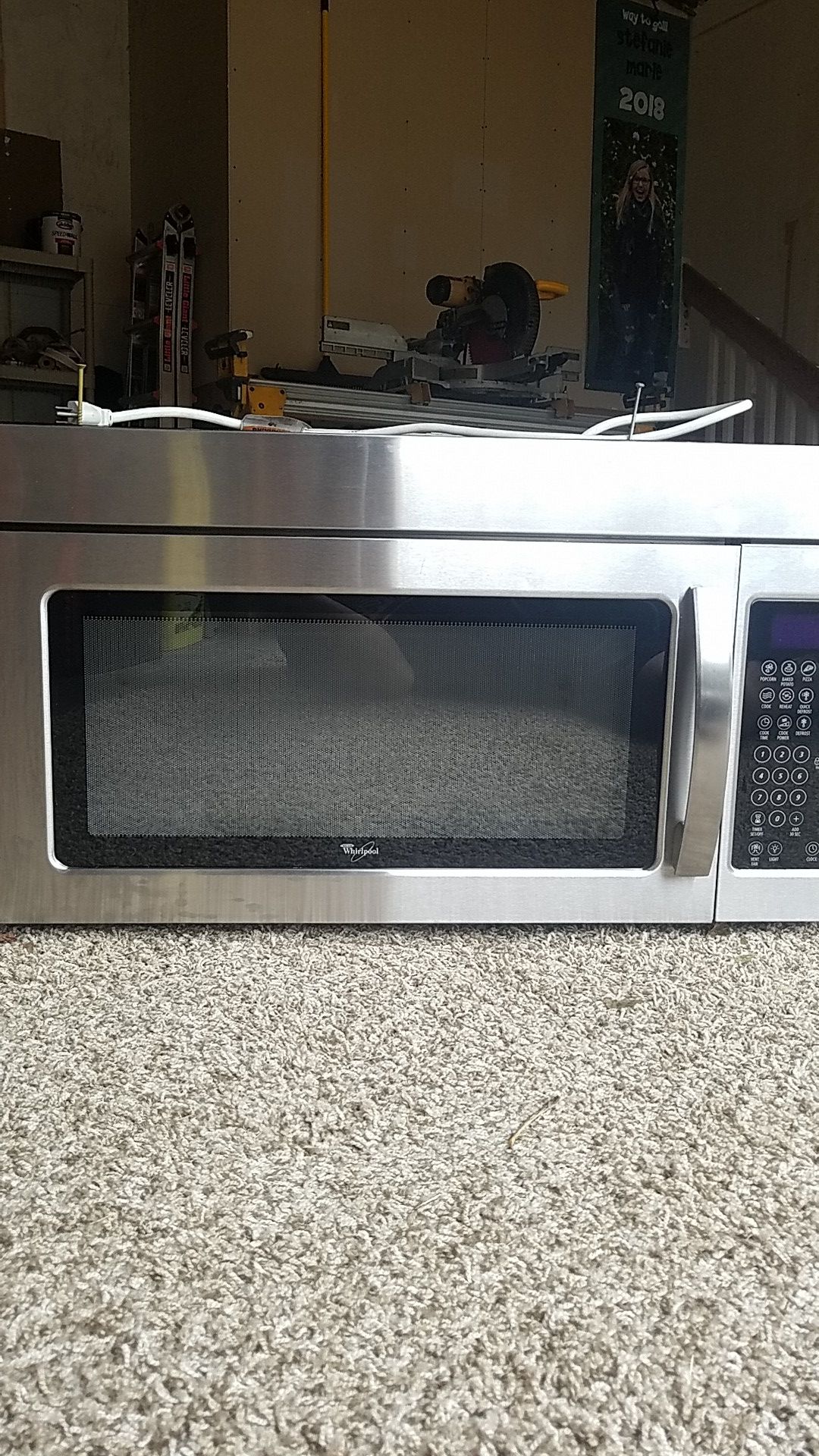 Whirlpool WMH1164XWS over range microwave.