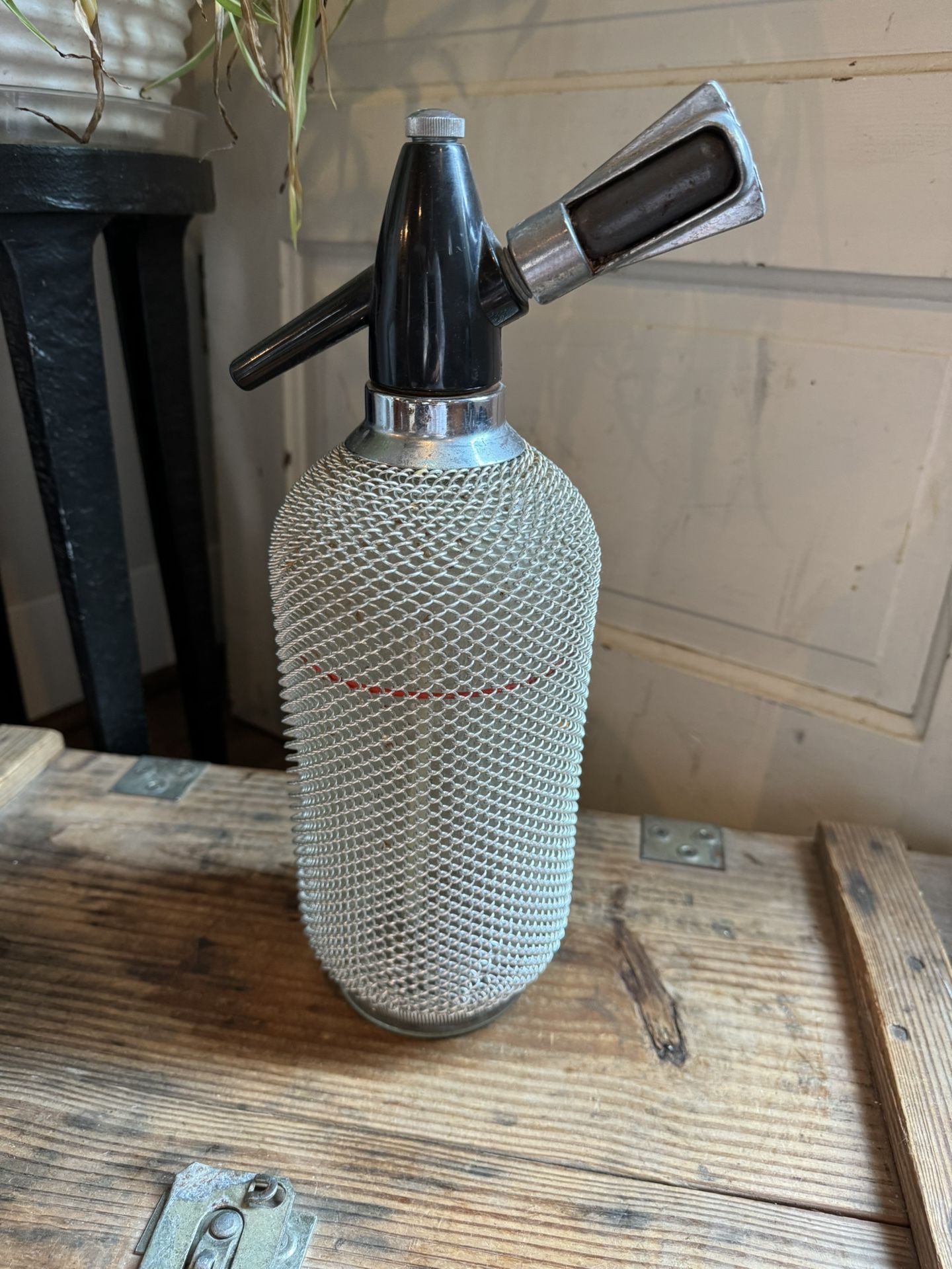 Vintage Soda Siphon Glass Seltzer Bottle with Mesh Cover.