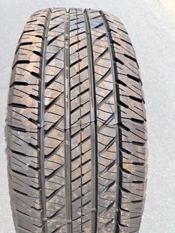 Single (1) 265 65 18 Cooper Evolution HT2 tire