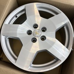 Set of 4 Chevy 18” Aluminum Rims. 1 great condition 3 scratched up as shown. Retail value $1,600. Selling all four $500. Text or call . 