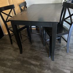 pub table and chairs