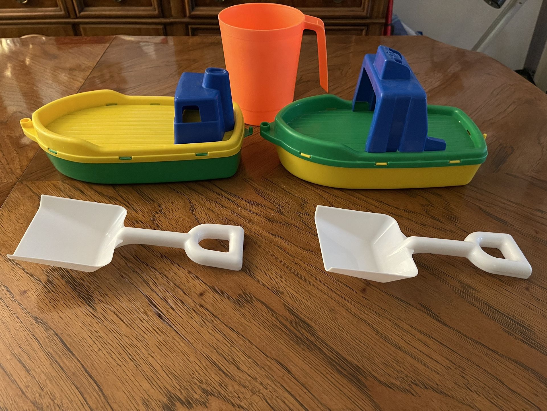 Beach or Pool Toys - 2 Toy Boats, 2 Shovels, and 1 Bucket with Handle