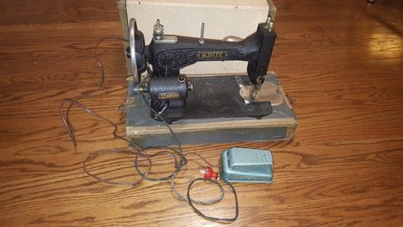 White rotary vintage sewing machine