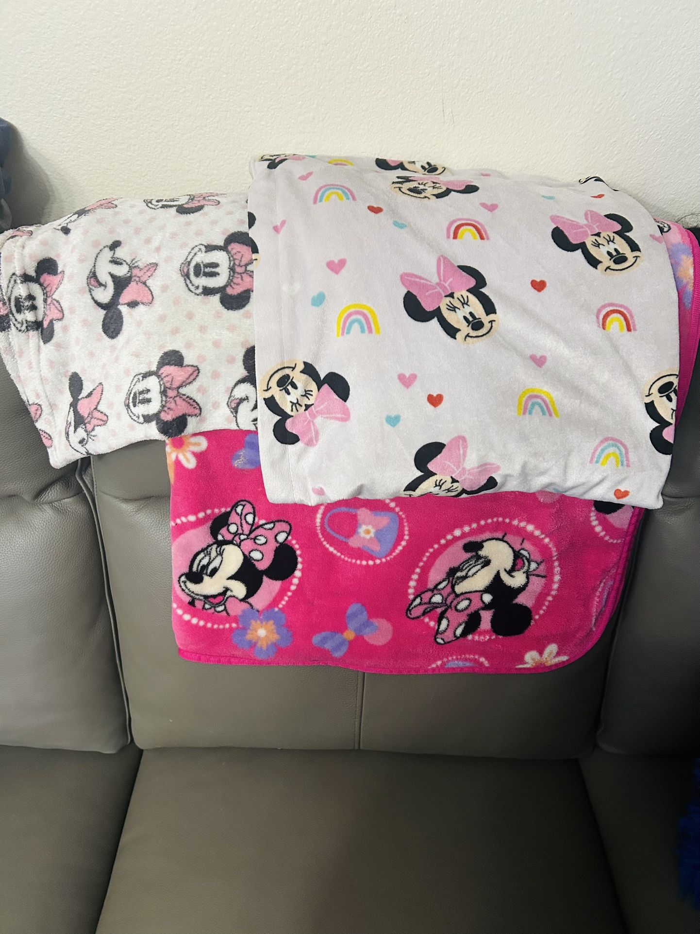 Three Minnie mouse covers
