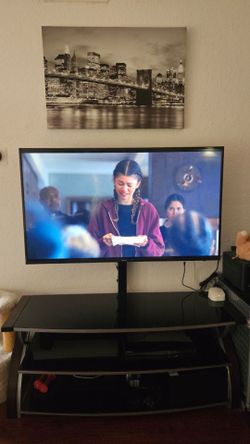 3 in 1 TV stand console up to 65" TV up to 135 lbs.