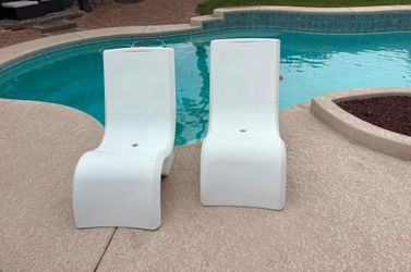 Step2 Vero In-Pool and Patio Outdoor Tall Lounger Chair Resin White.  It is designed to be used on a tanning ledge with up to 9 inches of water.