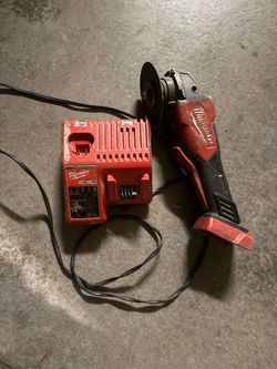 Milwaukee grinder and charger