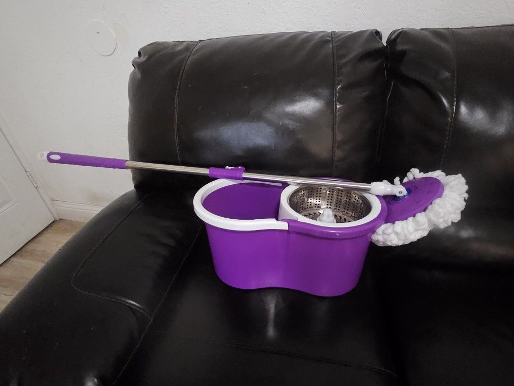 Brand new mop with bucket.