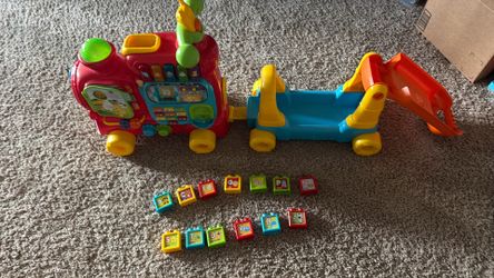 VTech alphabet train with some letter blocks