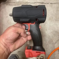 protective rubber boot for a Milwaukee m18mid torque impact wrench . This is only the boot $15 firm 