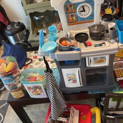 Toy Kitchen Deluxe Set With 3 Toy Food Sets, Chef Apron And Kitchen Wear. Toy Shopping Car Included 