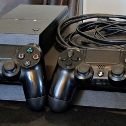 PS4 Base Model – HUGE 2TB Storage Upgrade! - Comes with 2 Controllers