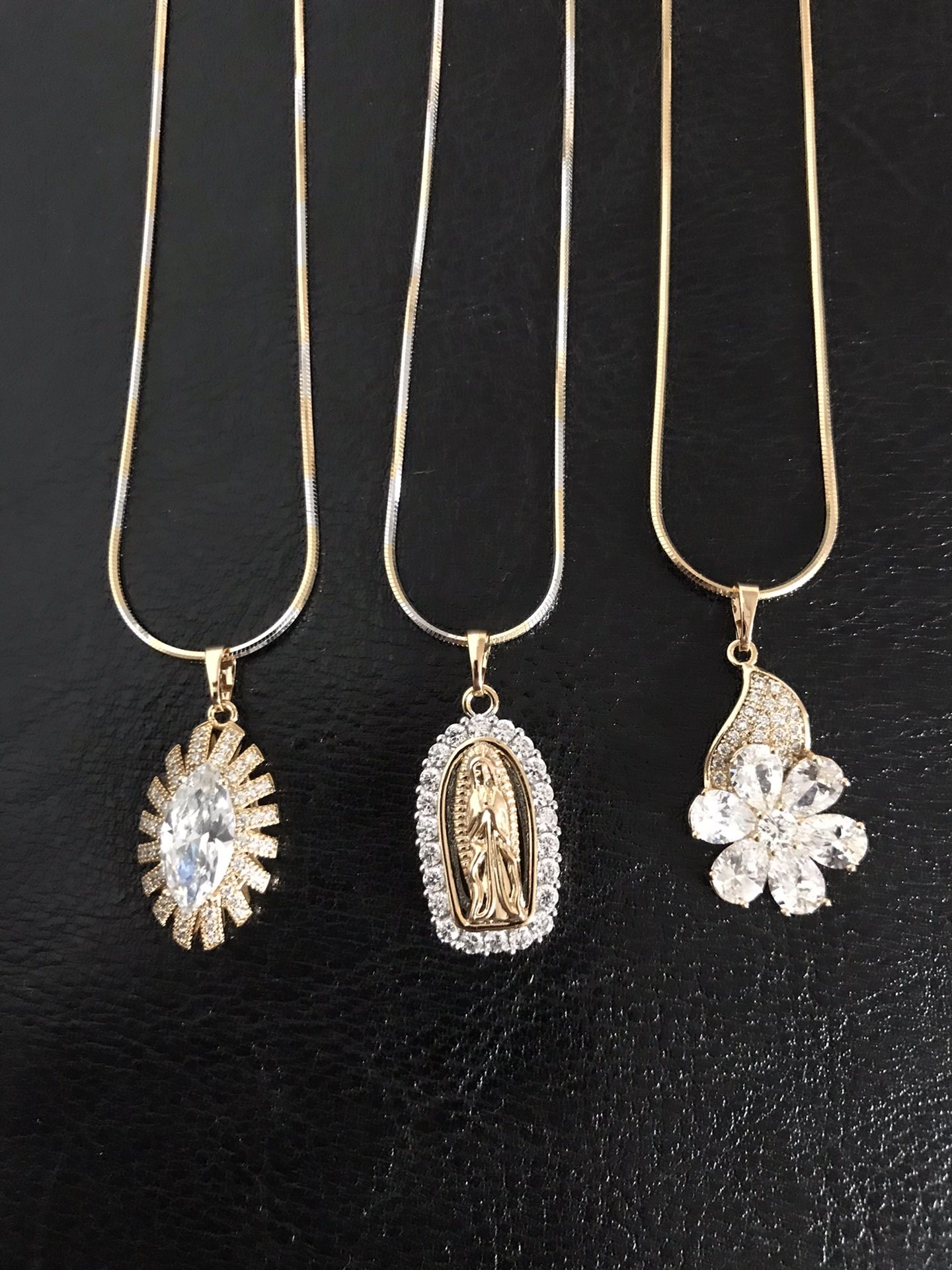 Gold plated pendant with chain ($10 each)