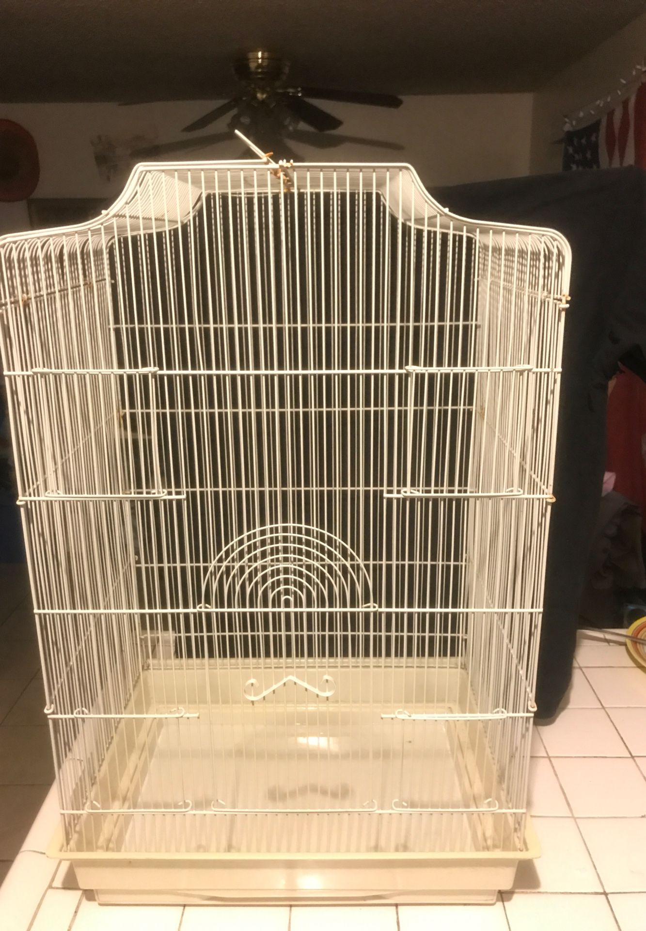 Large white bird cage for sale.