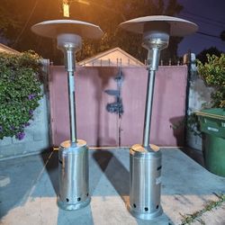 2 PATIO HEATERS STAINLESS STEEL SILVER STILL IN VERY GOOD CONDITION WORKS GREAT YOU CAN TEST IT BEFORE PURCHASE FOR ANY QUESTION TEXT ME PLEASE HABLO 