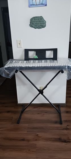 PSR E234 Yamaha 61 Keys Synthesizer / Piano. 4 Pieces: Synthesizer, Heavy Duty Stand, Peddle, and Music Sheet Holder.  