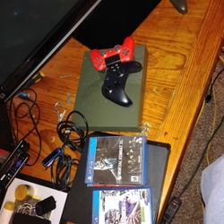 Xbox One S With Remote And Cords And Comes With Games And A PS4 And A PS4 Remote No Cords 