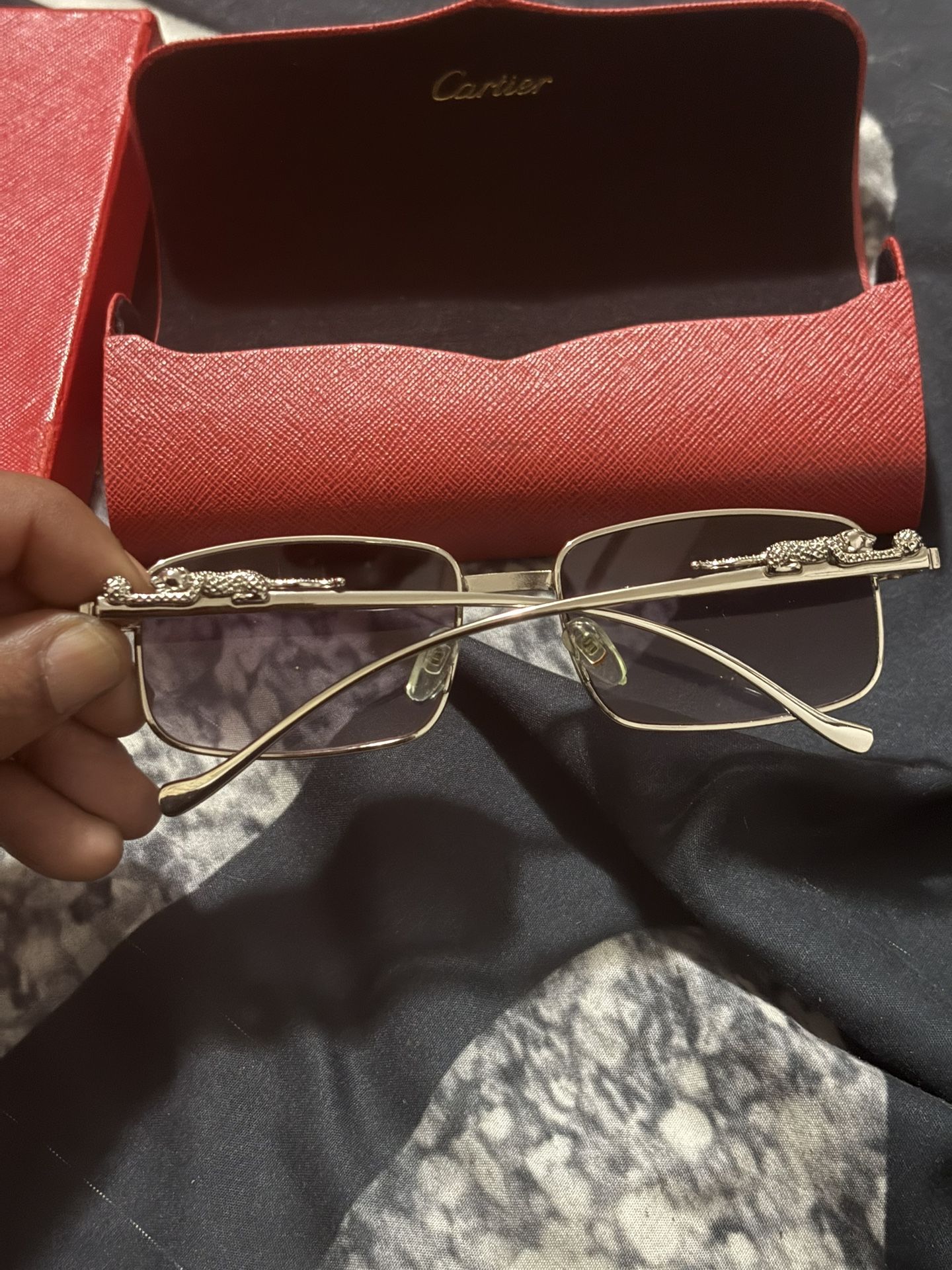 men Cartier shades with jaguar