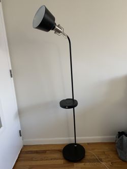 Floor Lamp With Charging Port And A Wireless Charging Station 