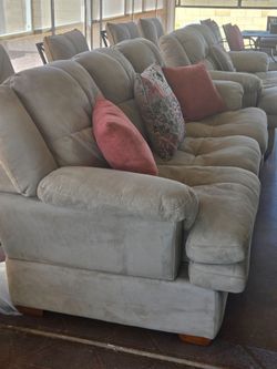 Matching tan sofa and loveseat
