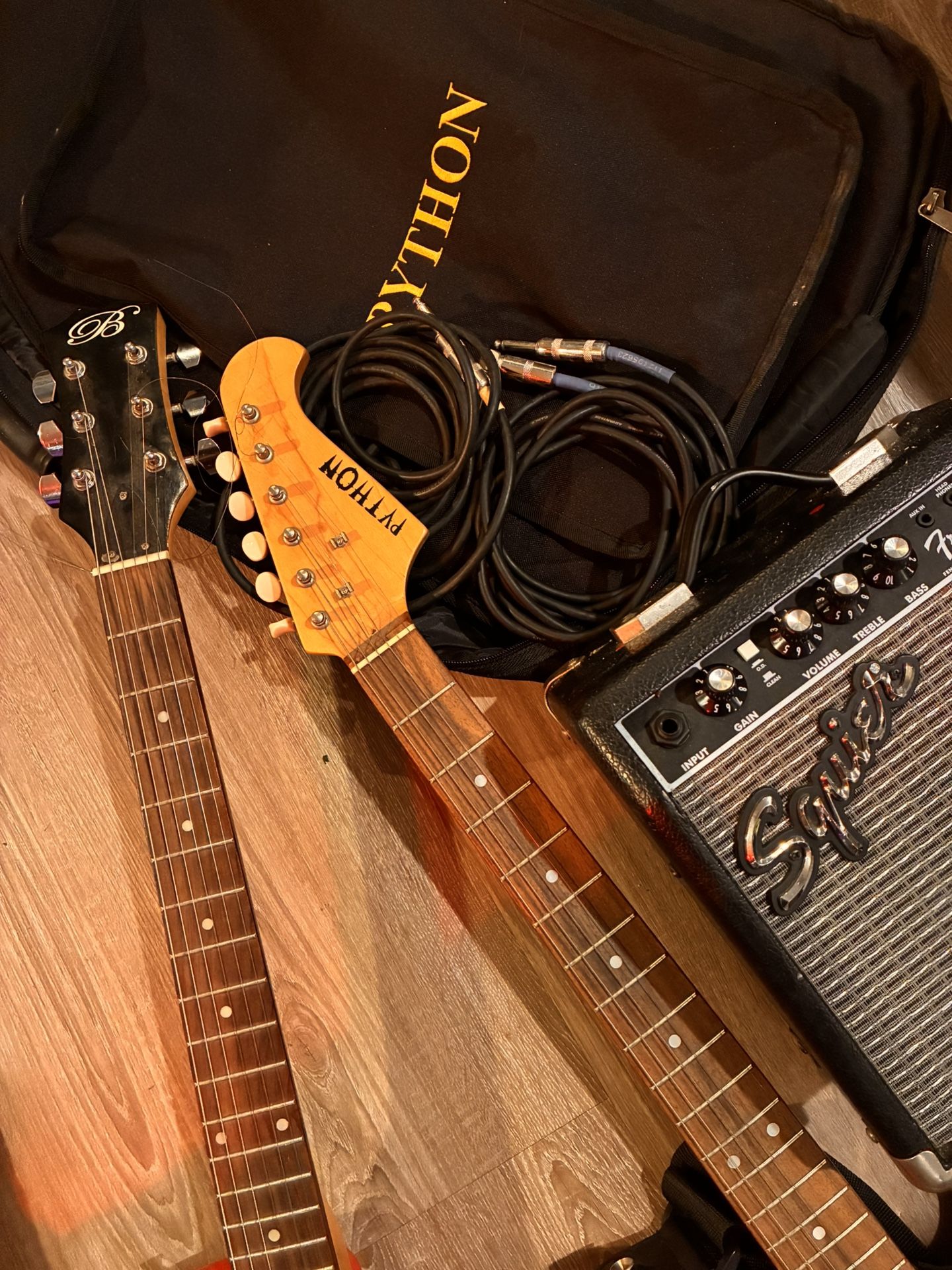 Two Electric Guitar With A Amplifier