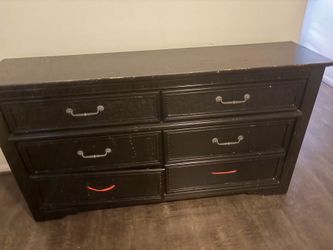 6 drawer black dresser with mirror.