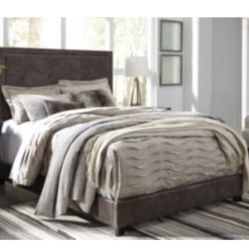 Dolante Queen Upholstered Bed With Metal Details