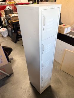 Locker with 5x doors, repainted White.