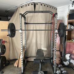 Squat rack/Plates/Olympic Bar/Dumbells