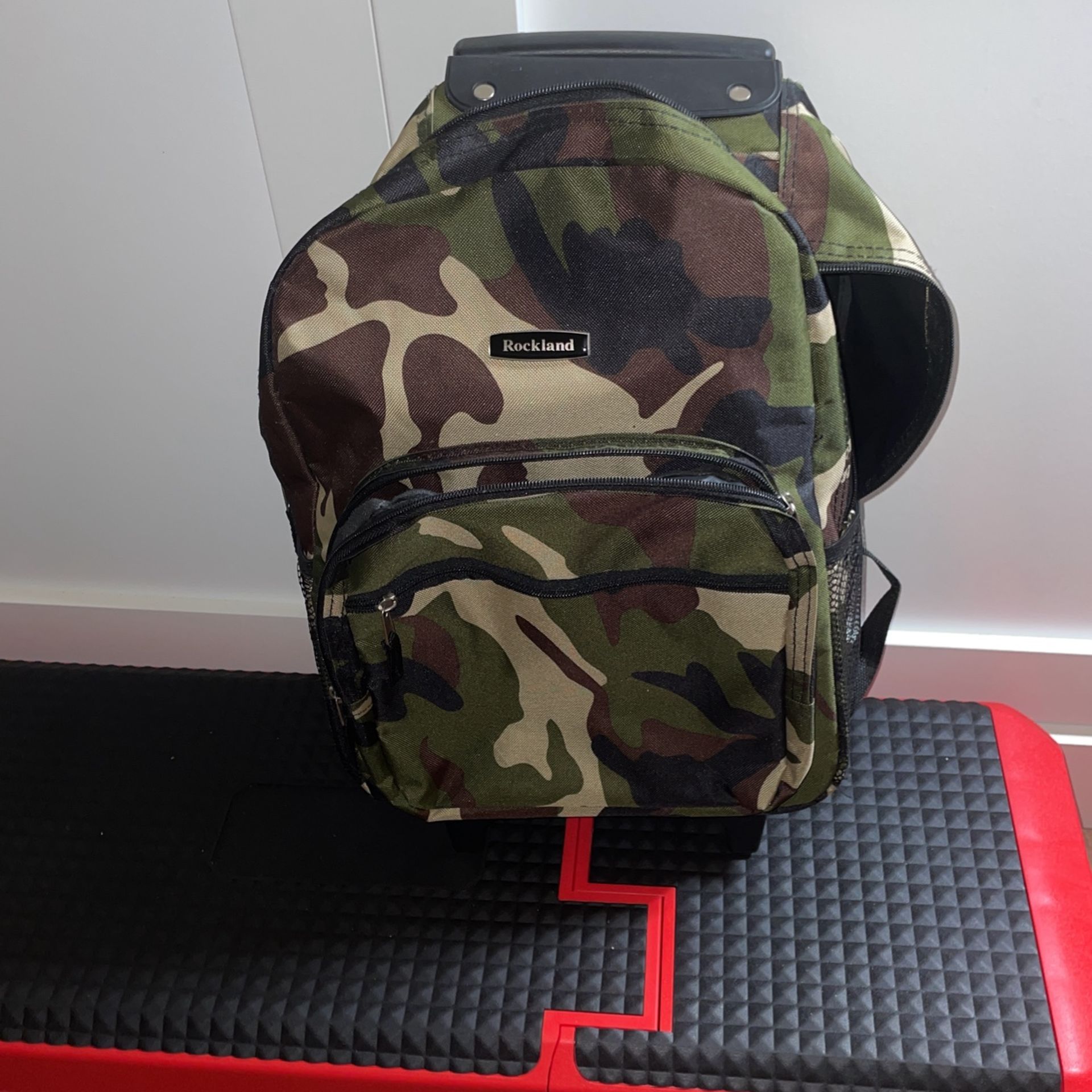 Rockland Rolling Backpack Used Once