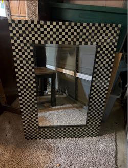 Large black and white checkered mirror